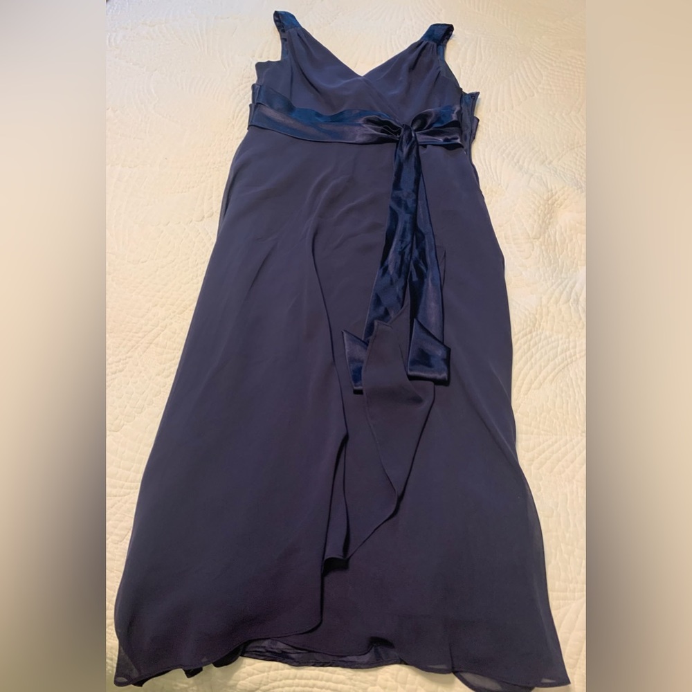Formal dress, dark blue. Very flattering.